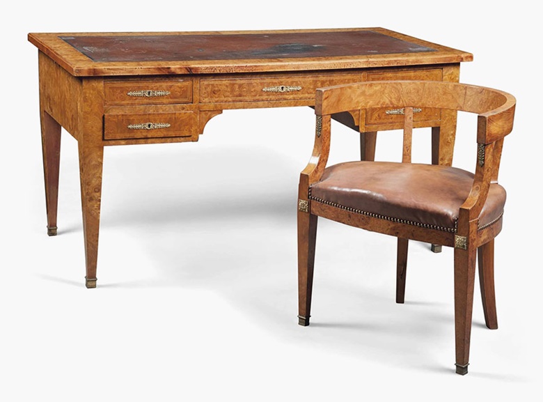 A French burr-elm desk and matching chair. Empire style, late 19thearly 20th century. Desk 29½ in (75 cm) high; 57½ in (146 cm) wide; 29½ in (75 cm) deep; chair 29 in (74 cm) high; 23½ in (60 cm) wide. This lot was offered in Interiors on 20 July 2016 at Christie’s in London, South Kensington