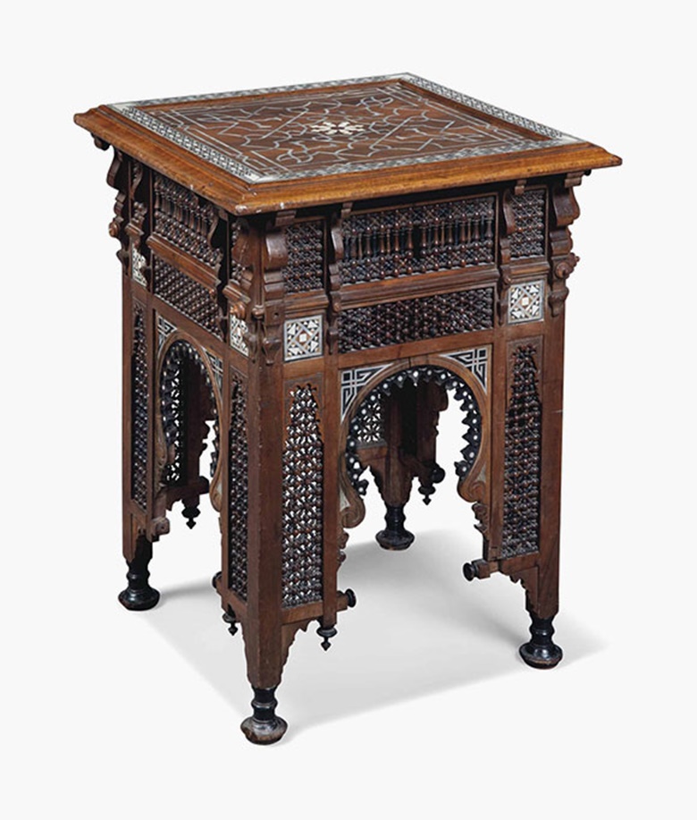 A Moorish ivory and mother-of-pearl-inlaid hardwood and ebonised occasional table, circa 1900. 29 in (74 cm) high; 21½ in (55 cm) square. Sold for £2,125 on 20 July 2016