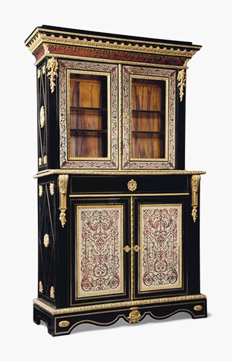 A Napoleon III ormolu-mounted, cut-brass and red tortoiseshell-inlaid, ebony boulle marquetry side cabinet. Third quarter 19th century. 82 in (208 cm) high; 52¾ in (134 cm) wide; 20½ in (52 cm) deep. Sold for £3,750 on 20 July 2016