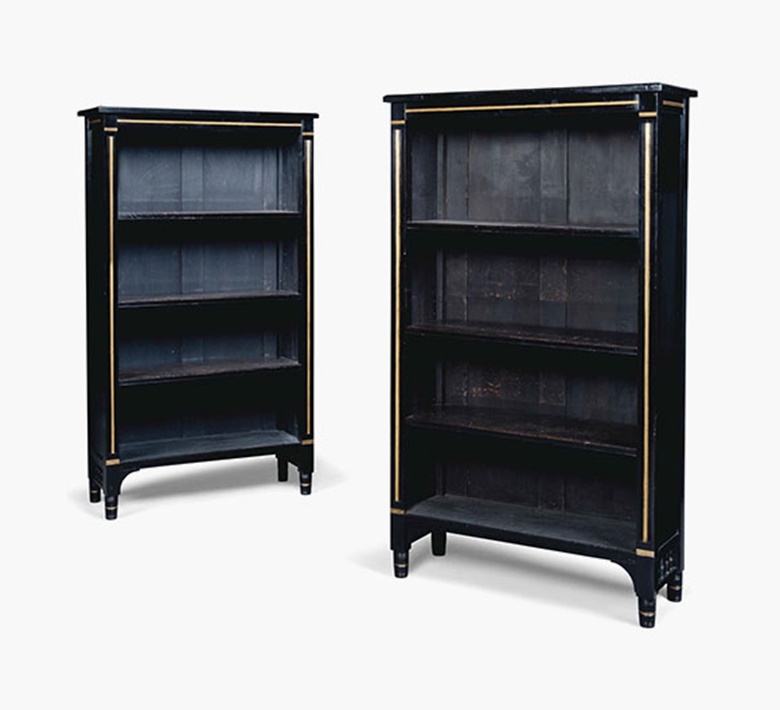 A pair of ebonised and gilt-heightened open bookcases. Late 19th century. Each 58½ in (148.5 cm) high; 33½ in (85 cm) wide; 13¼ in (33.5 cm) deep. Sold for £3,000 on 20 July 2016