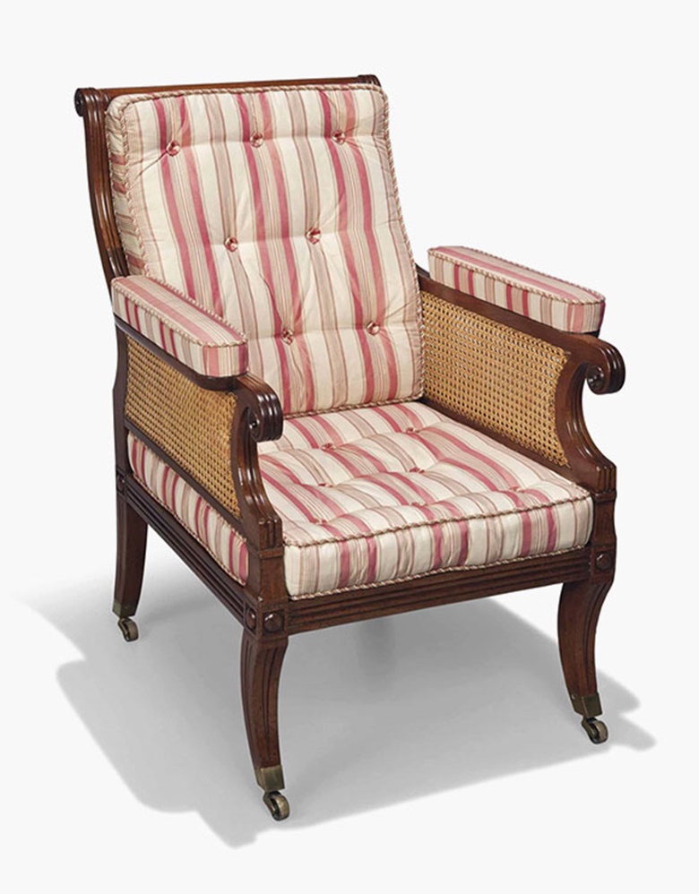 A Regency mahogany caned bergère. First quarter 19th century. 38½ in (98 cm) high; 27¾ in (70.5 cm) wide; 33 in (84 cm) deep. This lot was offered in Interiors on 20 July 2016 at Christie’s in London, South Kensington