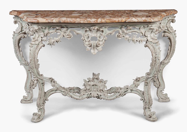 An Italian or German white and pale-green painted console table. Mid-18th century. 36½ in (93 cm) high; 65½ in (166.5 cm) wide; 24 in (61 cm) deep. Sold for £3,000 on 20 July 2016