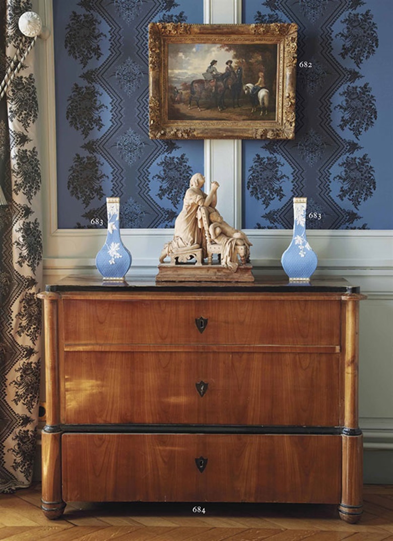 A Biedermeier cherrywood and ebonised commode. Austrian, circa 1825. 32½ in (82.5 cm) high; 44½ in (113 cm) wide; 16 in (41 cm) deep. Sold for €10,625  $11,986 on 28 September 2015