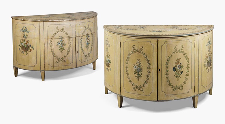 A close pair of George III polychrome-decorated demi-lune commodes. Early 19th century. Each 32 in (81.5 cm) high; 48 in (122 cm) wide; 21 in (53 cm) deep. This lot was offered in Interiors on 17 August 2016 at Christie’s in London, South Kensington and sold for £11,250