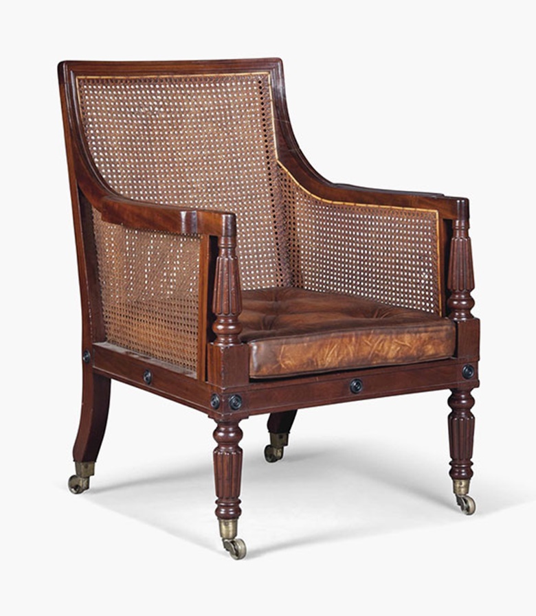 A Regency mahogany caned library bergère. Early 19th century. 37½ in (95 cm) high; 25½ in (65 cm) wide. This lot was offered in Interiors on 17 August 2016 at Christie’s in London, South Kensington and sold for £3,500