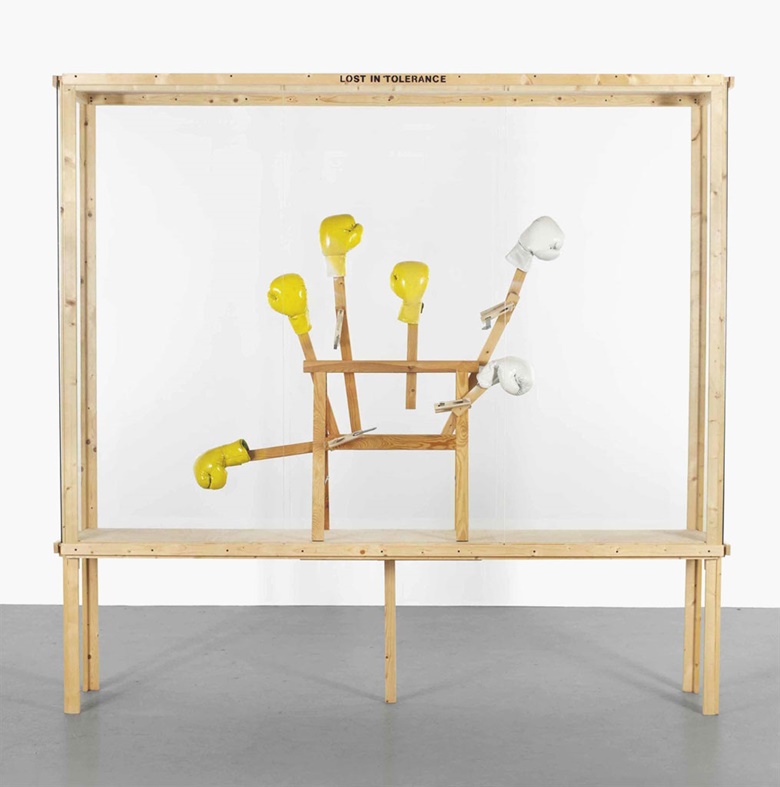 Georg Herold (b.  1947), Lost in Tolerance. Wood, glass, trestle, boxing gloves, clamps, screws and paint, 102⅜ x 108⅝ x 19¼ in (260 x 276 x 49 cm). Estimate £20,000-25,000. This lot is offered in Post-War & Contemporary Art Day Auction on 7 October 2016 at Christie’s in London, King Street
