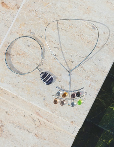 Vivianna Torun Bülow-Hübe (1927-2004), an early collar and pendant, 1951. 6¼ in (15.5 cm) high; 4⅜ in (11 cm) diameter. A necklace and an eight-drop pendant. 9⅝ in (24.5 cm) high; 5¾ in (14.5 cm) wide; 6 in (15 cm) deep. These lots were offered in Design on 26 October 2016 at Christie’s in London, King Street