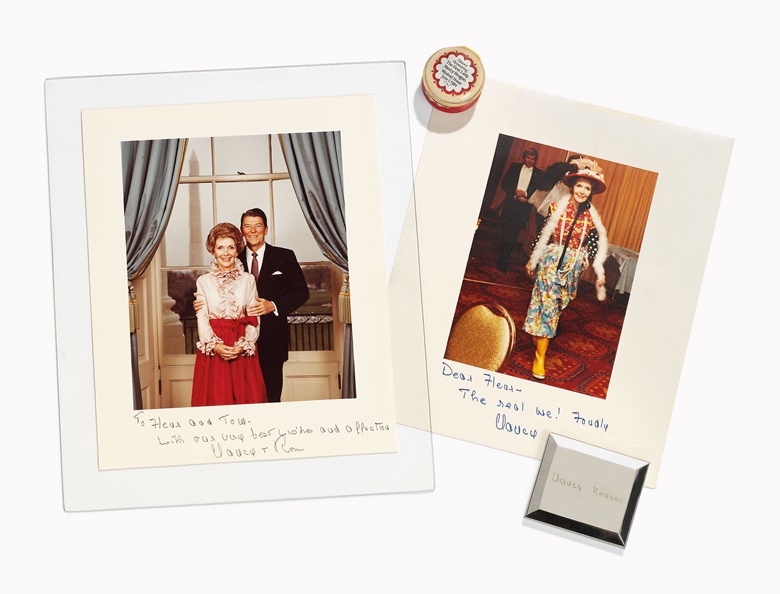 Of Ronald and Nancy Reagan interest; Two photographs and an American silvered metal compact. Late 20th century. The compact 2⅞ x 2 ½ in (7.3 x 6.5 cm). Estimate £800-1,200. This lot is offered in Christies Interiors on 23 November 2016 at Christie’s in London, South Kensington
