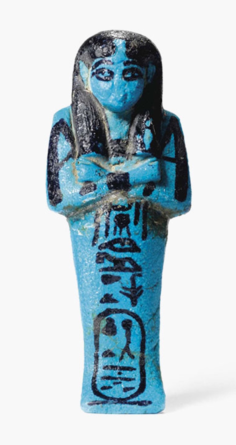 An Egyptian blue faience shabti for Queen Henuttawy. Third Intermediate Period, 21st dynasty, circa 1070-1032 B.C. 5 1316 in (12.2 cm) high. Estimate £6,000-8,000. This lot is offered in The Resandro Collection on 6 December 2016 at Christie’s in London, King Street