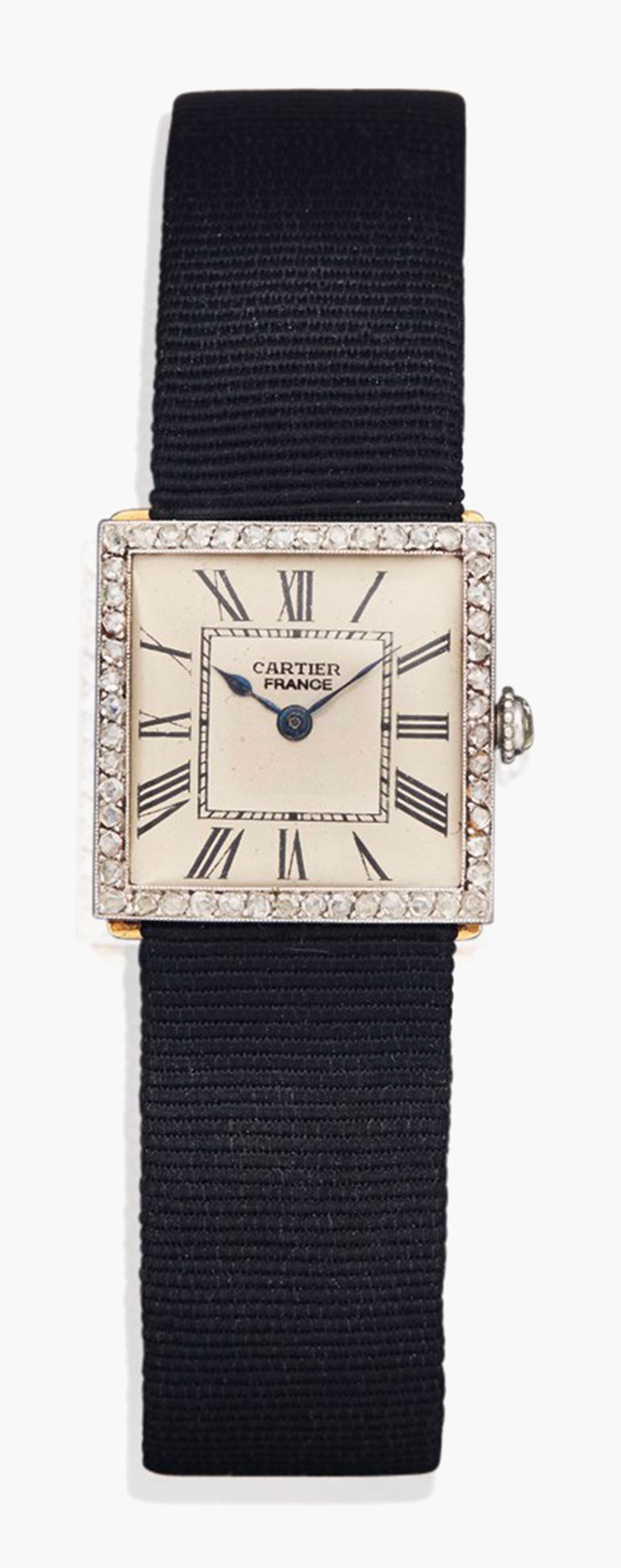 An early-20th-century diamond wristwatch, by Cartier. The square dial with black Roman numerals, blued steel hands, within a diamond-set bezel, to the diamond-set crown and black fabric bracelet, with gold and diamond-set deployant clasp, mechanical movement, circa 1913. Estimate SFr.8,000-12,000. This piece is offered in Magnificent Jewels on 17 May at Christies in Geneva