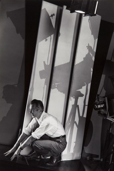 Edward Steichen (1879-1973), Self-Portrait with Photographic Paraphernalia, 1929. Gelatin silver print, mounted on board, printed later. Image 13⅝ x 9¼ in (34.7 x 23.5 cm). Sheet 13¾ x 9½ in (35 x 24.2 cm). Mount 18⅝ x 13½ in (47.4 x 34.3 cm). Estimate $6,000-8,000. This work is offered in the sale Photographs MoMA Pictorialism to Modernism in October 2017,