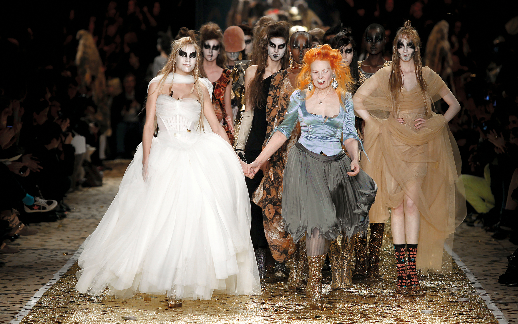 Vivienne Westwood wearing an ice-blue satin scoop-necked Cinderella dress, from the Gaia The Only One Collection, Spring-Summer 2011