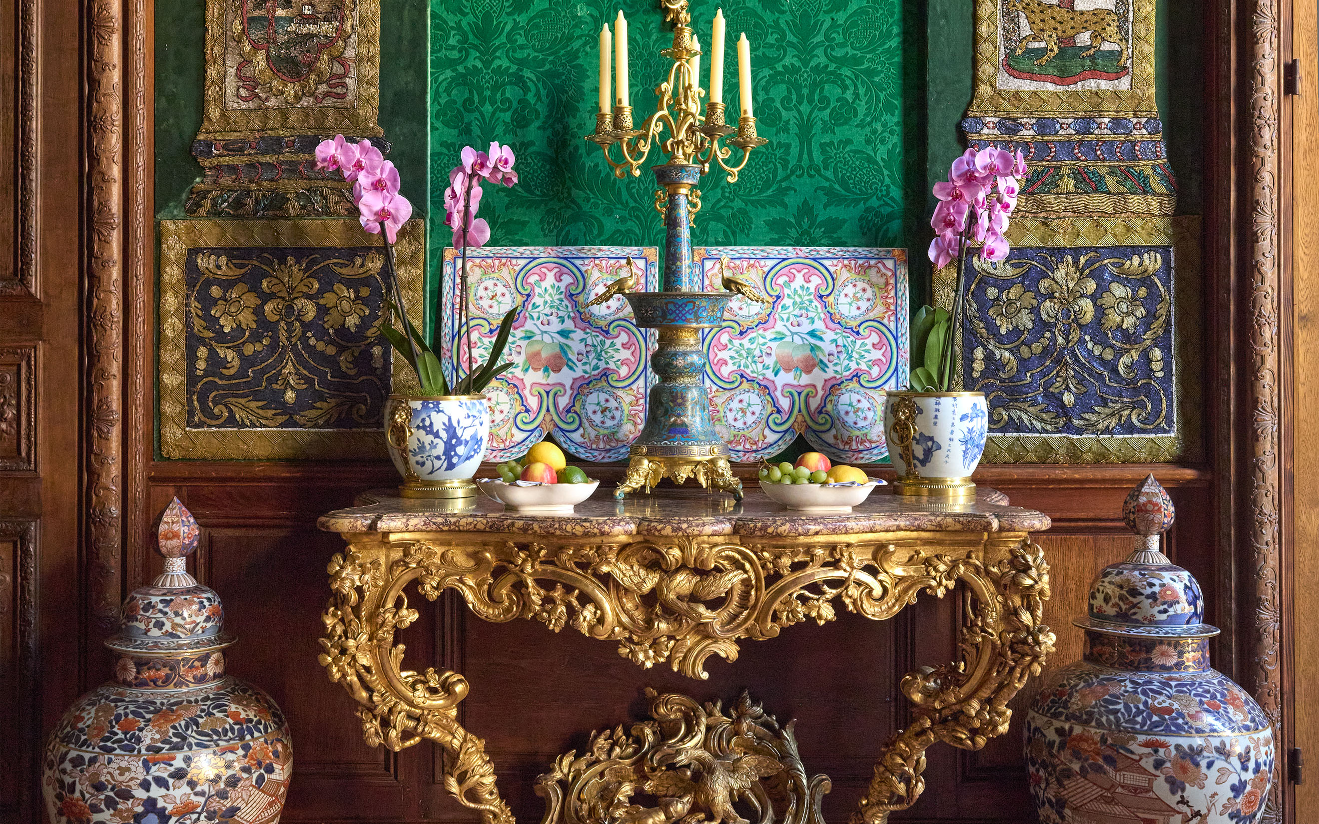 At Galerie Steinitz in Paris, a selection of pieces curated by the company’s director, Benjamin Steinitz. On the Louis XV giltwood console table, circa 1735-40 (estimate: €60,000-100,000), is one of a pair of Napoleon III ormolu-mounted Chinese cloisonne candelabra, circa 1865 (€50,000-80,000). Both offered in Madame Simone Steinitz: The Legacy of Taste on 19 June 2025 at Christie's in Paris