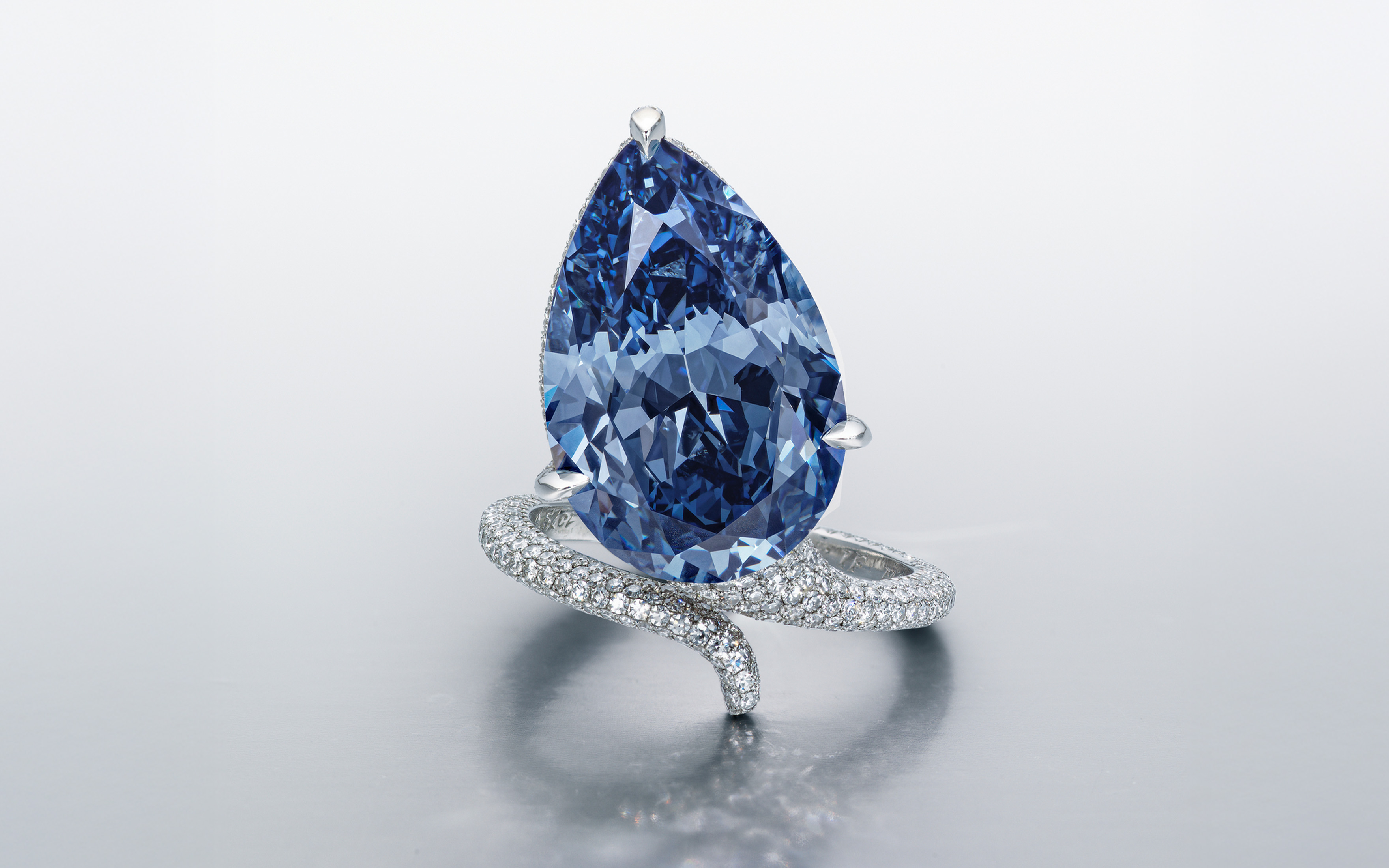 The Mellon Blue. A sensational coloured diamond and diamond ring. Fancy vivid blue modified pear brilliant-cut diamond of 9.51 carats, single-cut diamonds, platinum, offered in Magnificent Jewels on 11 November 2025 at Christie's in Geneva