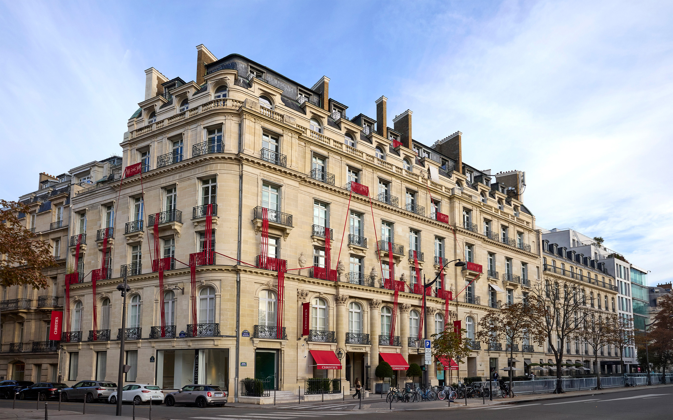 Installation view of Stephane Thidet's Le Fil Rouge on the facade of Christie's in Paris. 'My initial design was influenced by the rhythms found in lines made by sewing machines'