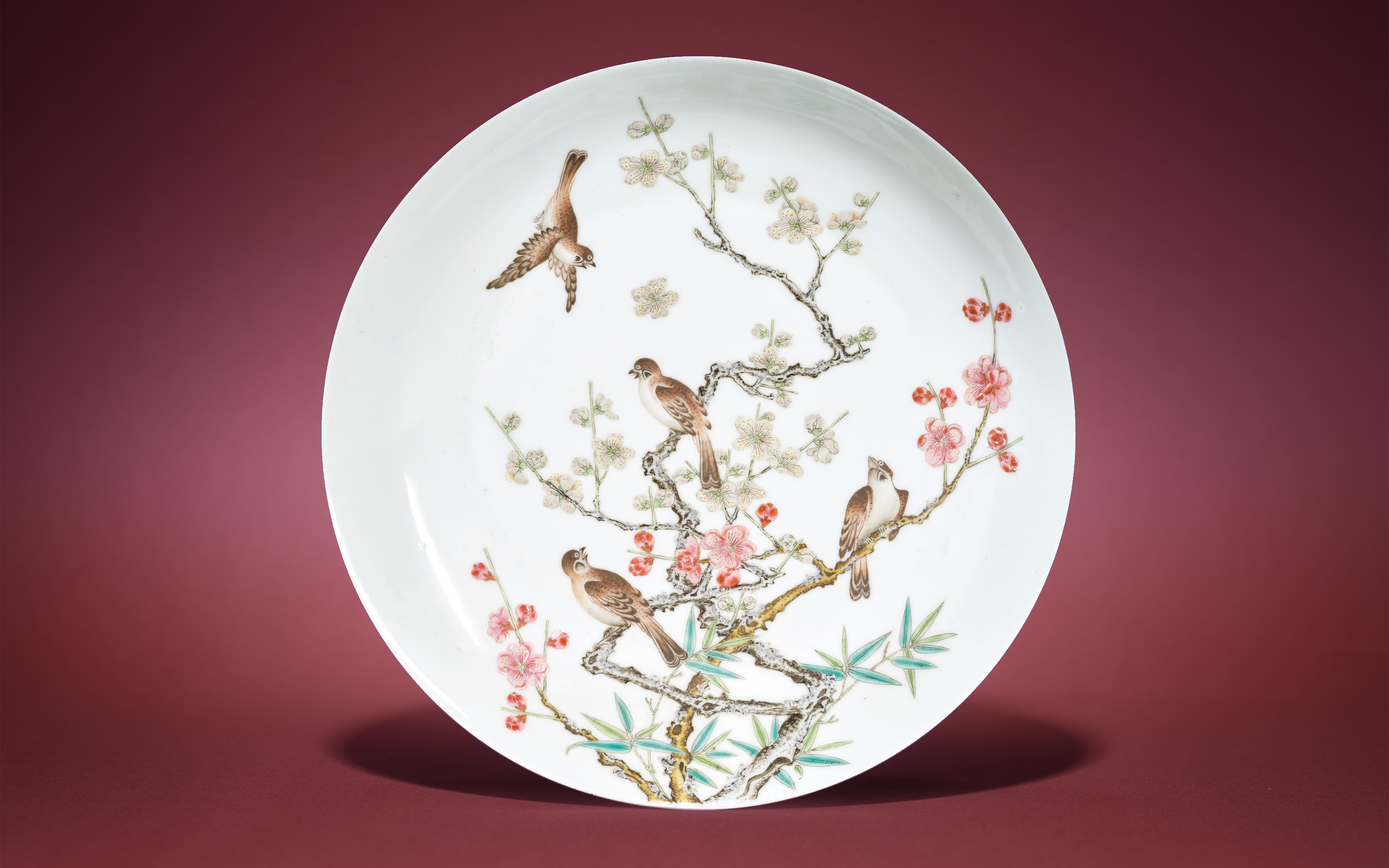 A very rare and fine famille rose black-back ‘flowers and birds’ dish. China, Qing dynasty. The porcelain: Yongzheng six-character mark within a double circle in underglaze blue and of the period (1723-35). The enamels: possibly later, offered in Art of Asia Including the Palmer Family Collection - Online until 12 November 2025 at Christie's Online
