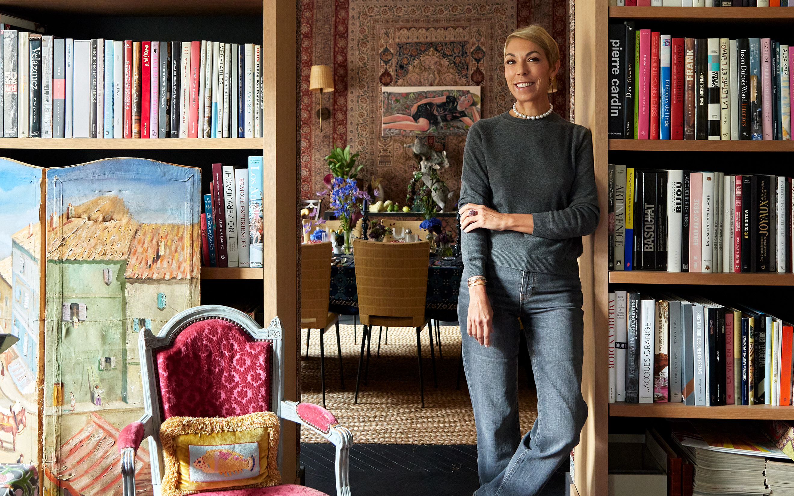 Mathilde Favier in her former home. On the left is an Italian four-leaf screen, circa 1950-60, offered in Mathilde and Friends in Paris, 26 January to 4 February 2026 at Christie's Online