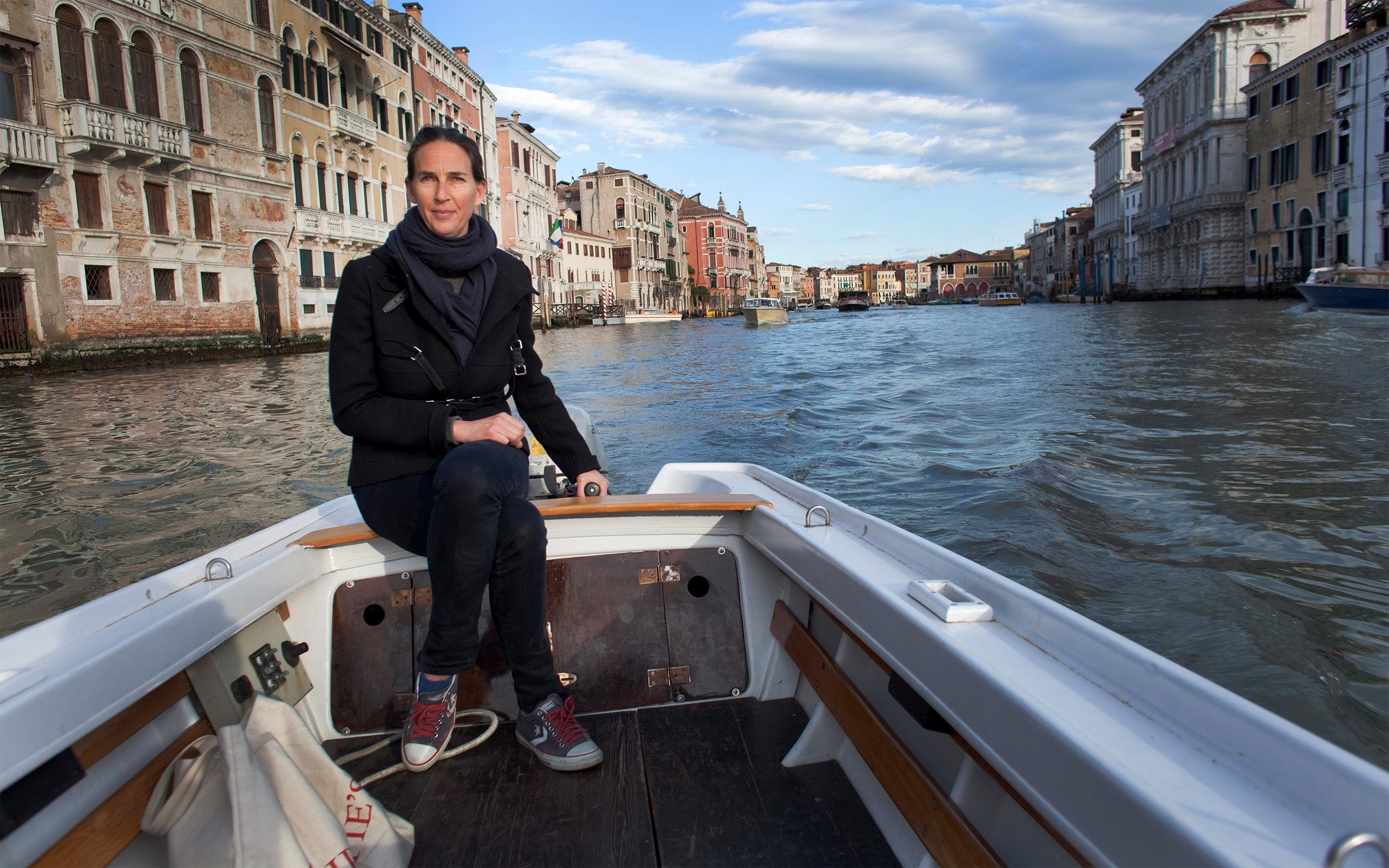 Bianca Arrivabene on the Grand Canal at the tiller of her boat, a gift from her husband