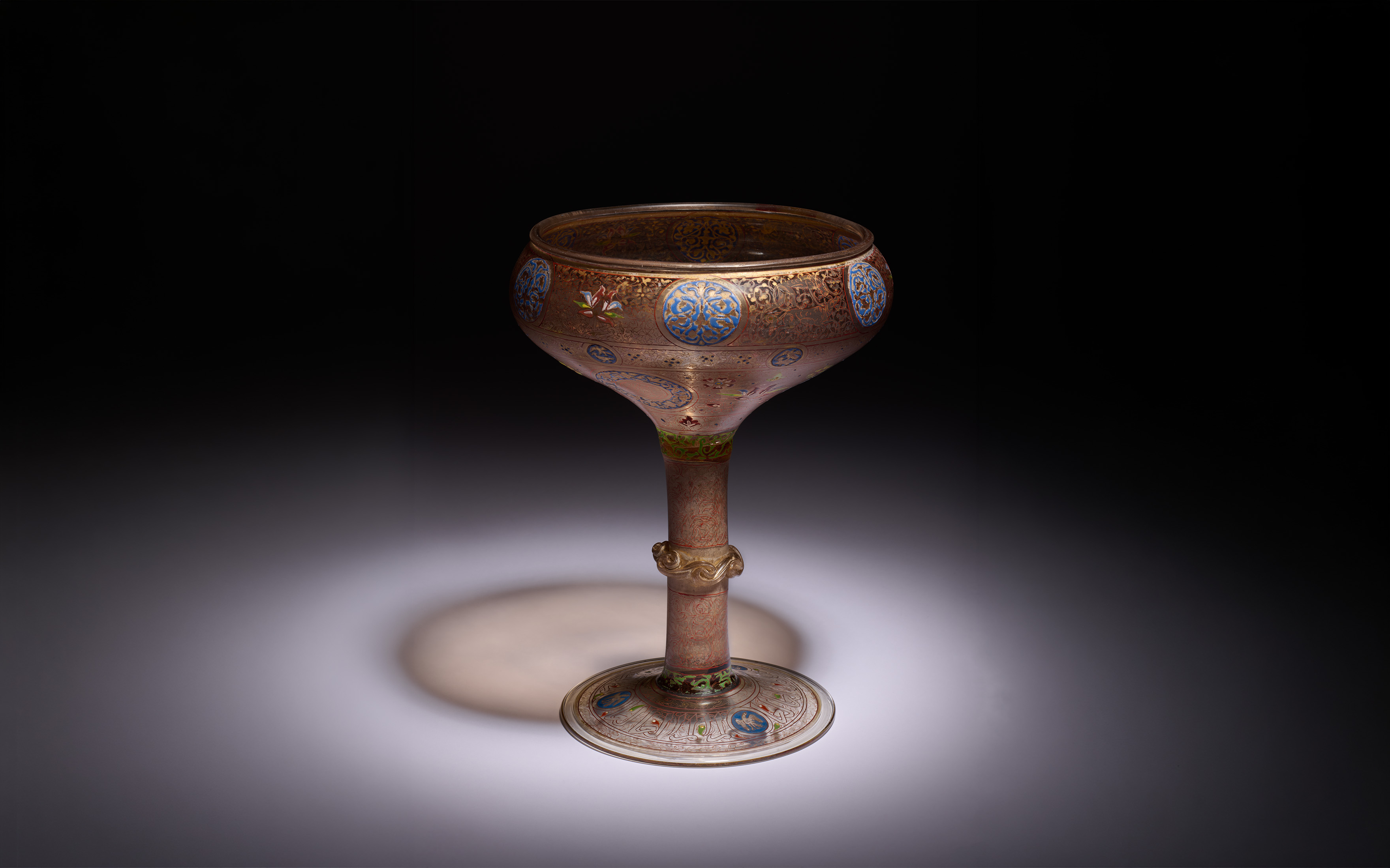 An important Mamluk gilded and enamelled glass footed bowl, probably Mamluk Syria, second quarter 14th century, offered in Art of the Islamic and Indian Worlds including Rugs and Carpets on 30 April 2026 at Christie's in London