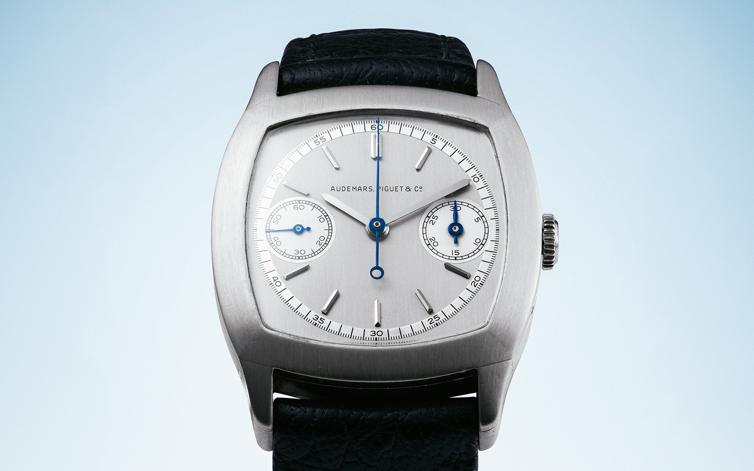 Audemars Piguet. A unique, historically significant platinum cushion-shaped single-button chronograph wristwatch with two-tone dial, movement circa 1930. 'Coussin Tortue' model, no. 41'849, offered in Rare Watches on 11 and 12 May 2026 at Christie's in Geneva. In the short film above, Sebastian Vivas of Audemars Piguet talks to Remi Guillemin, Christie's head of Watches and Wristwatches, Europe and Americas, about the significance of its rediscovery