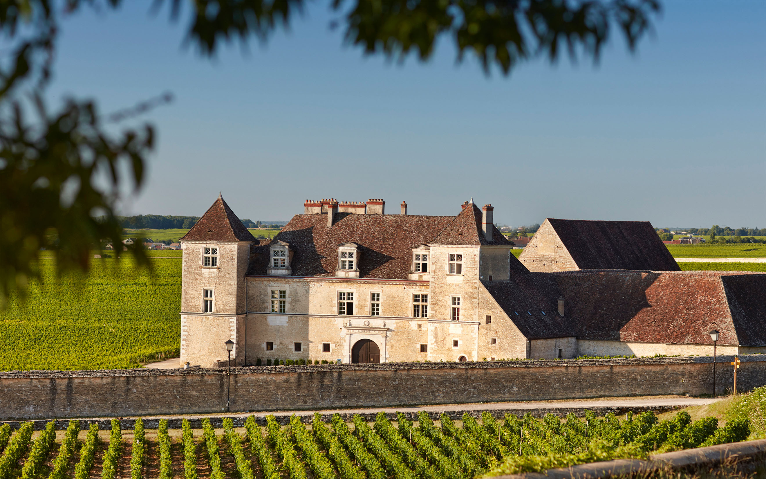 Chateau du Clos de Vougeot, where the Cistercians began growing vines in 1109, remains a jewel of Burgundy today as the largest single vineyard in the Cote de Nuits entitled to the Grand Cru designation