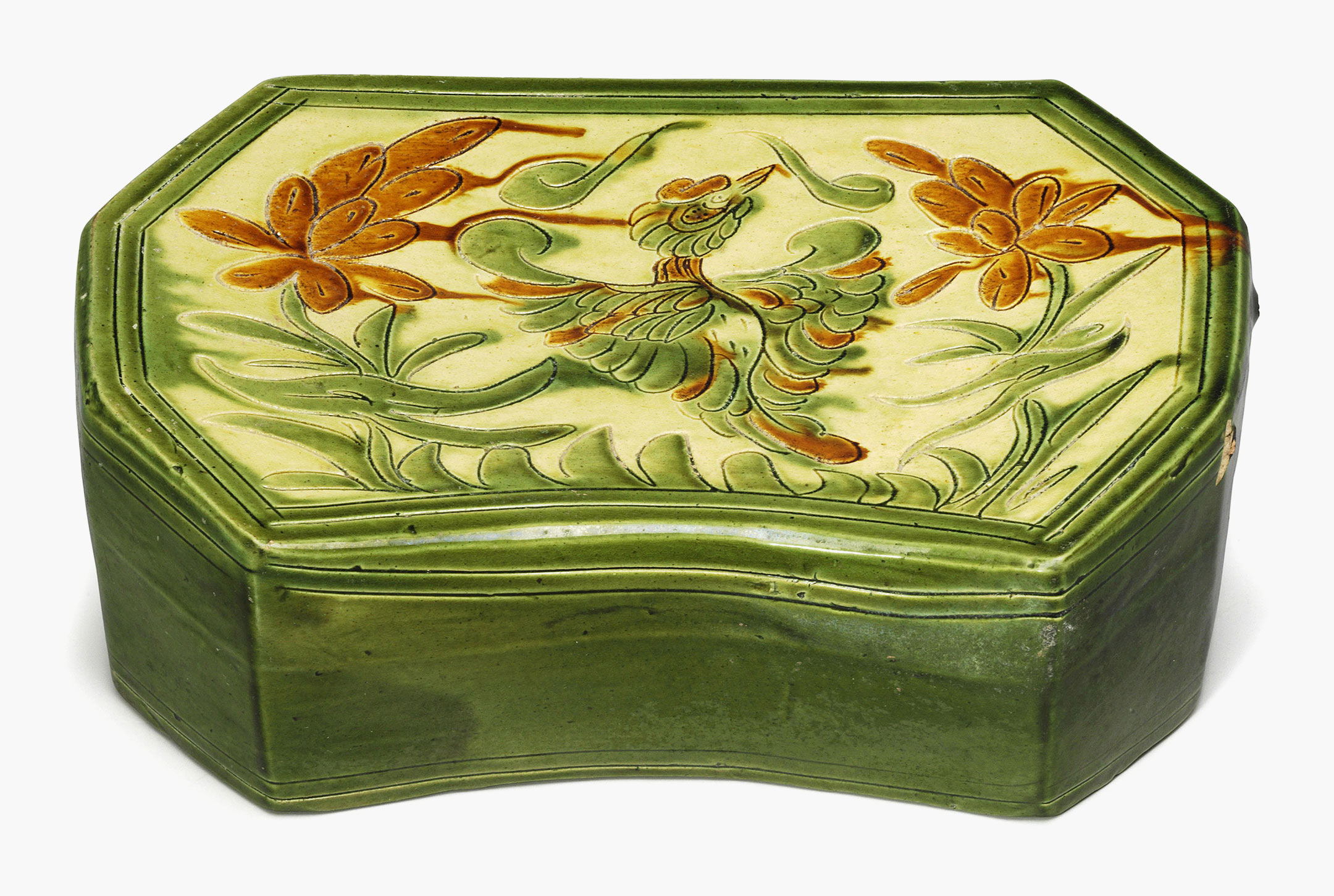 A cream, ochre and green-glazed ‘phoenix’ pillow. China, Jin dynasty (1115–1234). 12 3/4 in. (32.2 cm.) long. Estimate: $3,000–5,000. This work is offered in the Asian Art Inspired by Nature online auction on 19–28 April