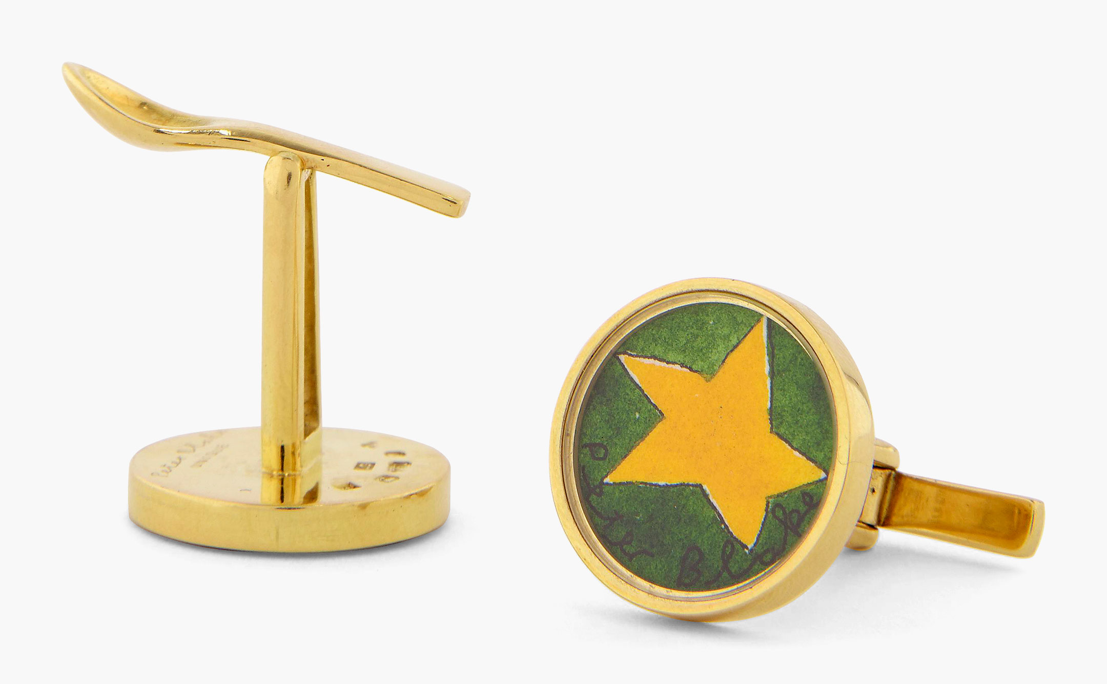 Peter Blake, Yellow Star, Cufflinks,&nbsp;2008. Gold cufflinks with watercolour on paper. Stud diameter:&nbsp;⅞
in. (2cm.) Estimate: $5,000-8,000. This work is offered in Art as Jewellery, 6-18 May, Online