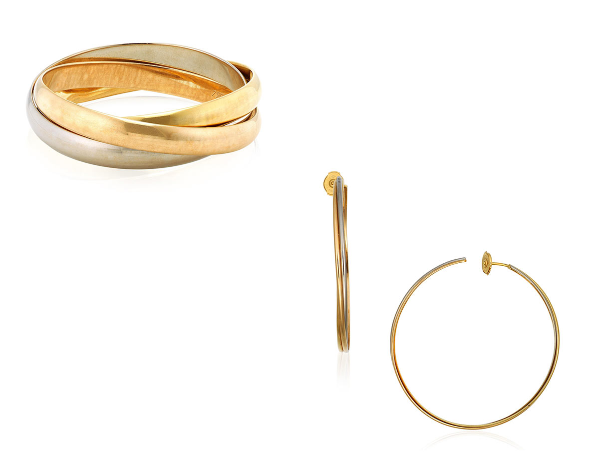 Cartier gold 'Trinity' jewellery set. Comprising a bangle and earrings of tri-gold entwined triple hoop design. Estimate: HKD $15,000–25,000