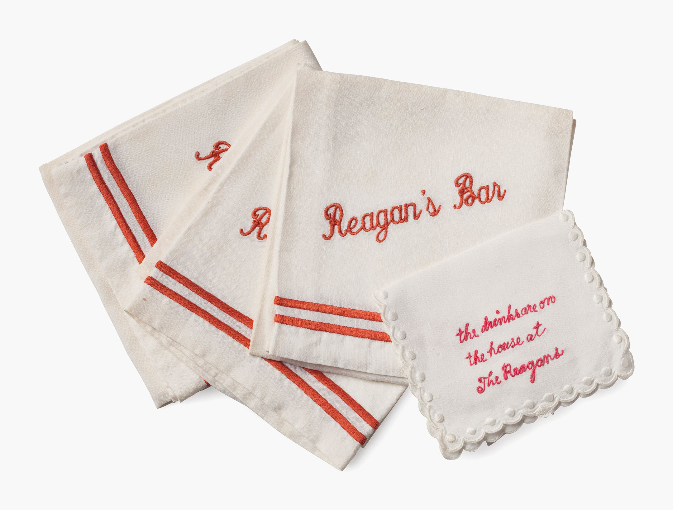 The Reagans’ Bar — A group of bar napkins, second half 20th century. Comprising five large napkins embroidered ‘Reagan’s Bar’ and a smaller napkin embroidered ‘the drinks are on the house at The Reagans’. Estimate: $200-400. This lot will be offered in The Private Collection of President and Mrs. Ronald Reagan, 21-22 September at Christie's in New York
