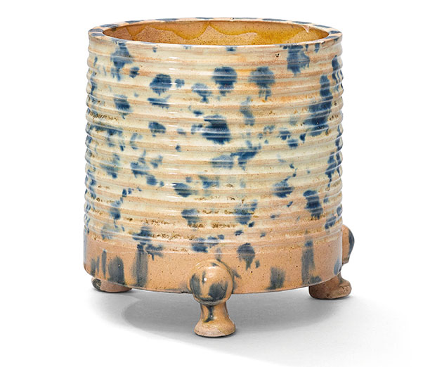 A blue-splashed sancai-glazed cylindrical tripod censer. Tang dynasty (618-907). 6¼ in (16 cm) high, box. This work was offered in The Pavilion Sale on 4 October 2016 at Christie’s Hong Kong and sold for HK$237,500/$US30,800
