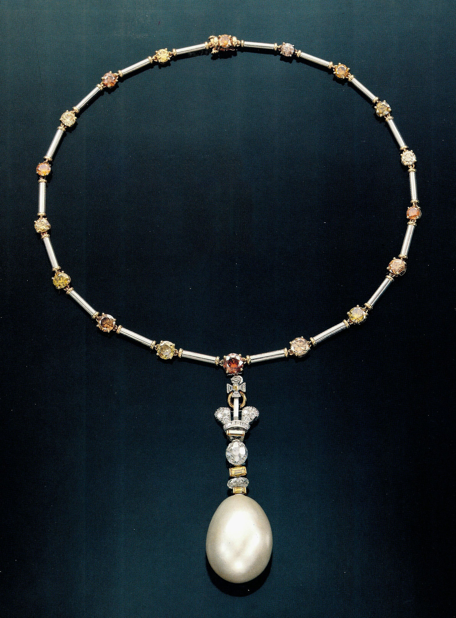 

The &lsquo;R&eacute;gente&rsquo; pearl set on a coloured diamond necklace. Sold at Christie&rsquo;s New York on 16 June 1987