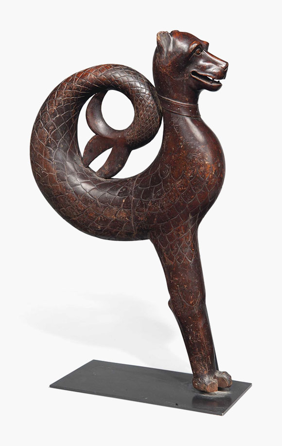 A walnut model of a merlion. Italy, 19th century. 33&frac12; in (85 cm) high, on stand. Estimate: &pound;3,000-5,000. This lot is offered in Seward Kennedy&rsquo;s Cabinet of Curiosities and The Tony Robinson Collection of Treen Drinking Vessels on 22 November 2016 at Christie&rsquo;s in London, South Kensington