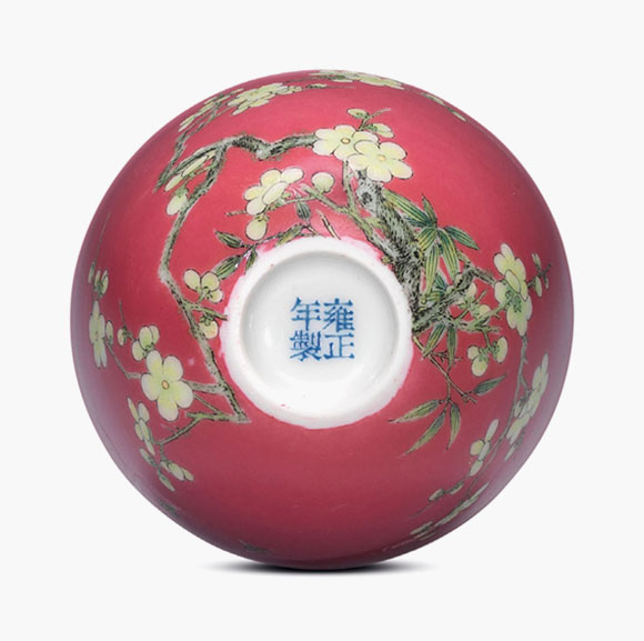 A fine and highly important falangcai ruby-ground ‘prunus’ cup. Yongzheng four-character mark in blue enamel and of the period (1723-1735). Estimate: HK$40,000,000-50,000,000. This work is offered in the Important Chinese Ceramics and Works of Art sale on 30 November at Christie’s Hong Kong
