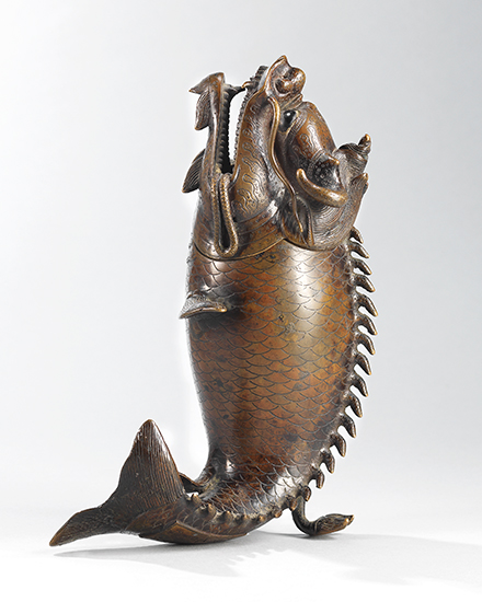 A bronze dragon fish-form censer, late Ming dynasty. 8 in (20 cm) high. Sold for HK$175,000 on 4 April 2017 at Christie&rsquo;s in Hong Kong