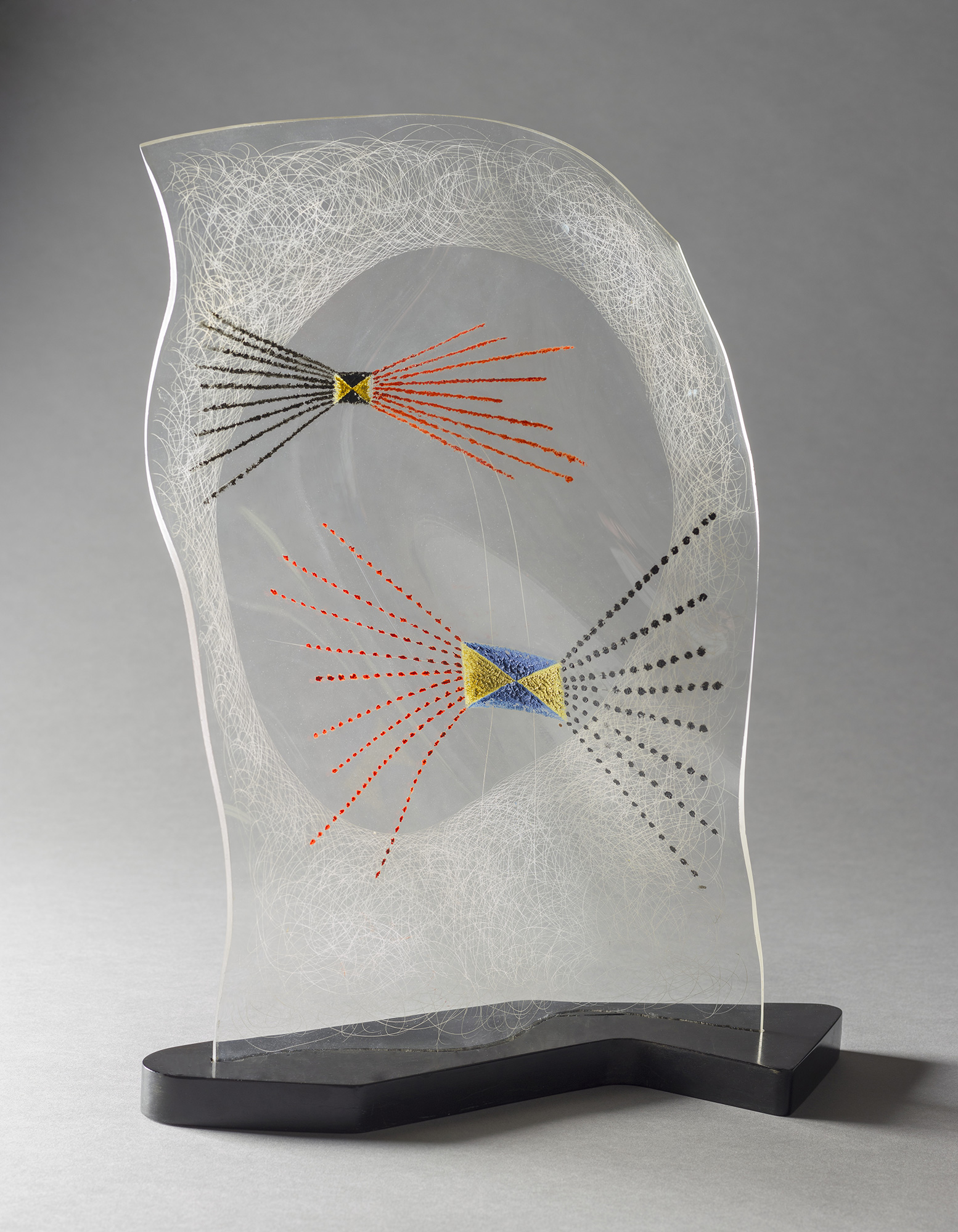 László Moholy-Nagy, Vertical Black, Red, Blue, 1945. Oil and incised lines on Plexiglas, on original base. 18 × 14¼ × 6¼ in. Los Angeles County Museum of Art, Purchased with funds provided by Alice and Nahum Lainer, the Ducommun and Gross Acquisition Fund, the Fannie and Alan Leslie Bequest, and the Modern and Contemporary Art Council (M.2012.135a-b) © 2017 Hattula Moholy-Nagy/Artists Rights Society (ARS), New York/VG Bild-Kunst, Bonn, photo © 2016 Museum Associates/LACMA
