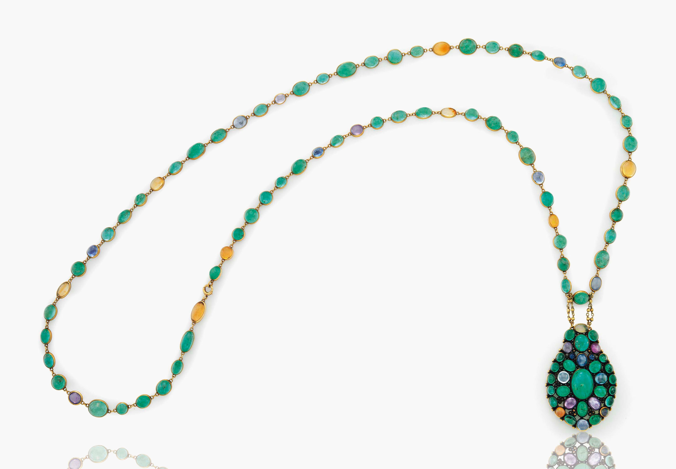 A cabochon emerald, sapphire, coloured sapphire and fire opal pendant necklace by Louis Comfort Tiffany, Tiffany & Co. Estimate: $25,000-35,000. This lot is offered in Magnificent Jewels & the Rockefeller Emerald on 20 June 2017, at Christie’s in New York