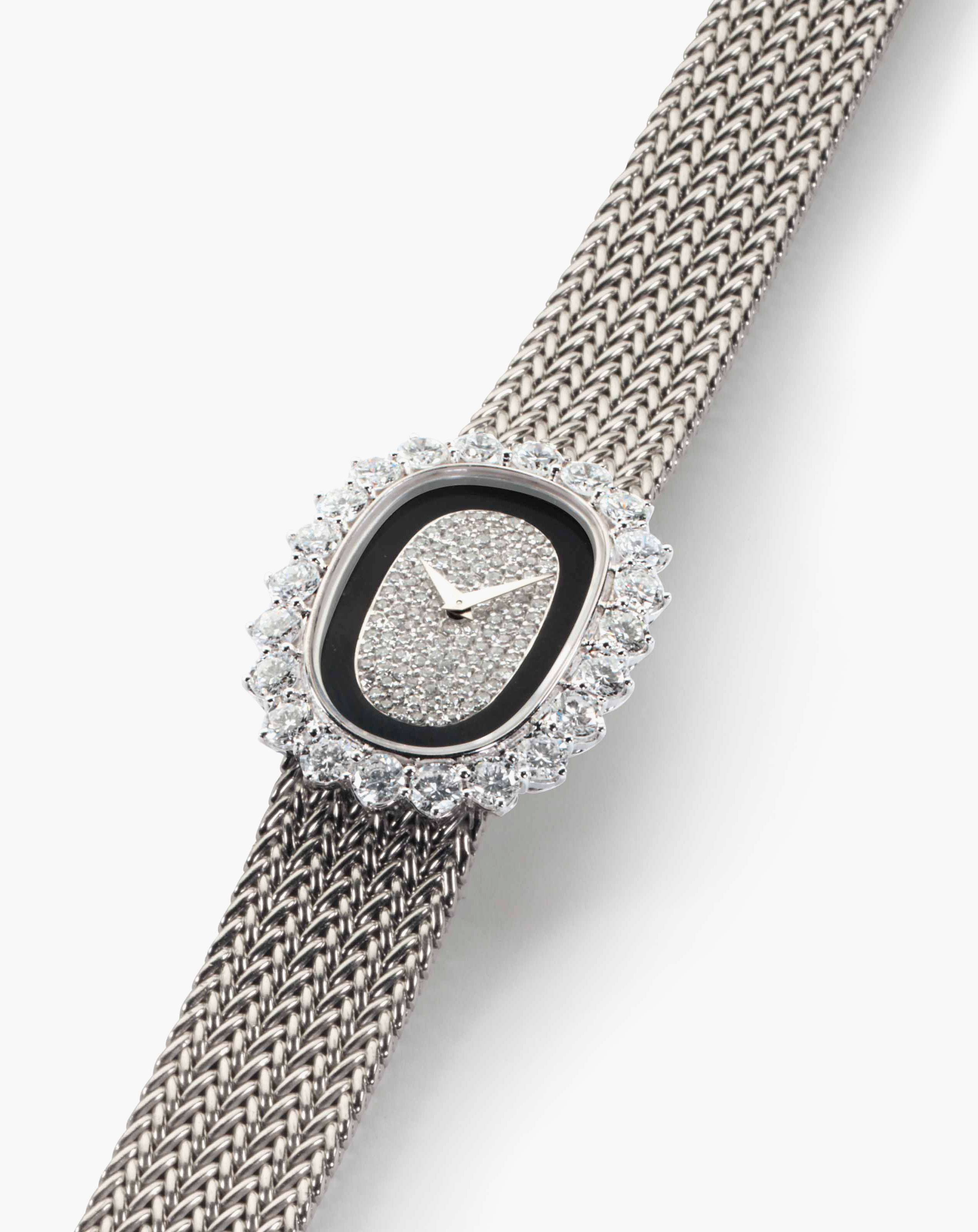 Vacheron Constantin. A lady's fine 18k white gold, onyx and diamond-set bracelet watch. Signed Vacheron Constantin. Case No. 520'998 P. Circa 1970. This lot was offered in Rare Watches and American Icons on 21 June 2017 at Christie’s in New York