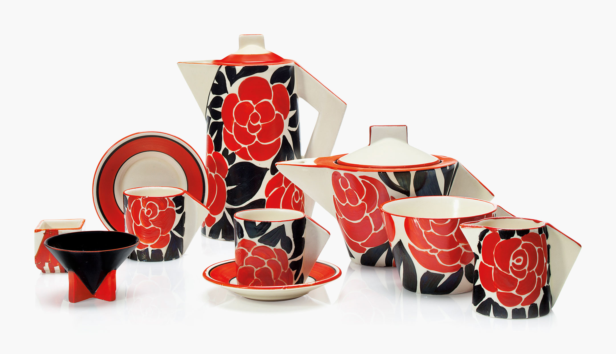 A Clarice Cliff six-piece tea and coffee service. Second quarter 20th century, various printed, 7&frac12; in (19 cm) high, the coffee pot. This lot was offered in Clarice Cliff Ceramics: The Andr&eacute; Aerne Collection sold to benefit the Muskegon Museum of Art, 14-25 August 2017, Online, and sold for $2,000