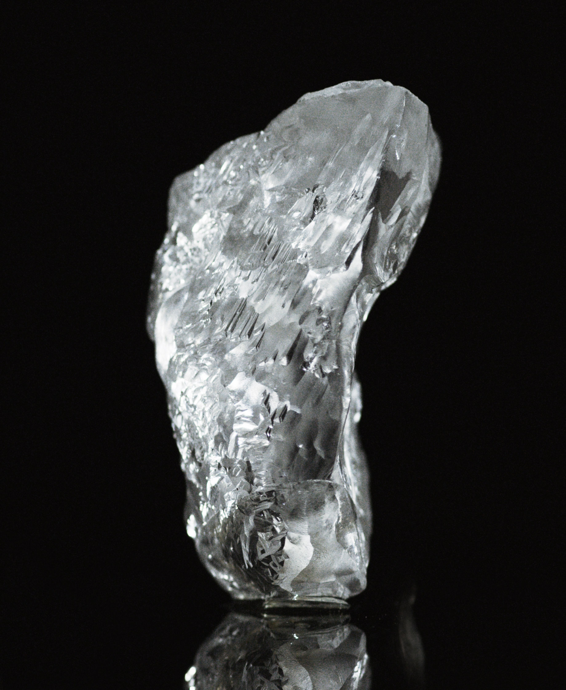 The original, 404.20 carat rough diamond that was mined in eastern Angola — the 27th largest rough white diamond ever discovered