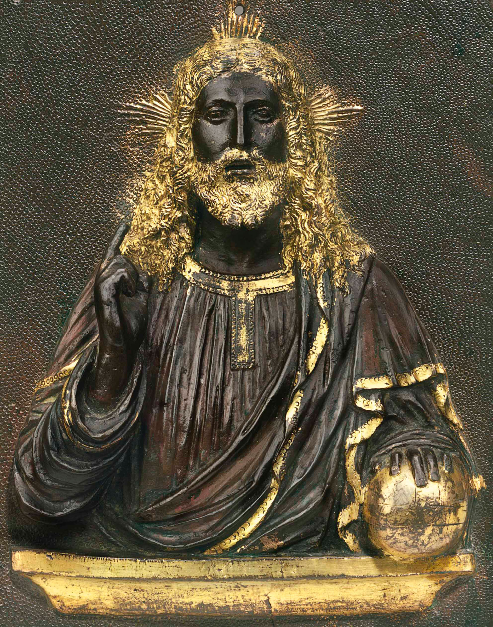 Attributed to the Master of the Barbarigo reliefs (active 1485-1515), possibly Antonio Lombardo, a parcel-gilt rectangular bronze relief of Christ as Salvator Mundi, c. 1515. 6½  in (16.5  cm) high; 5⅛  in (13  cm) wide. Sold for $605,000 on 28 January 2015  at Christie’s in New York