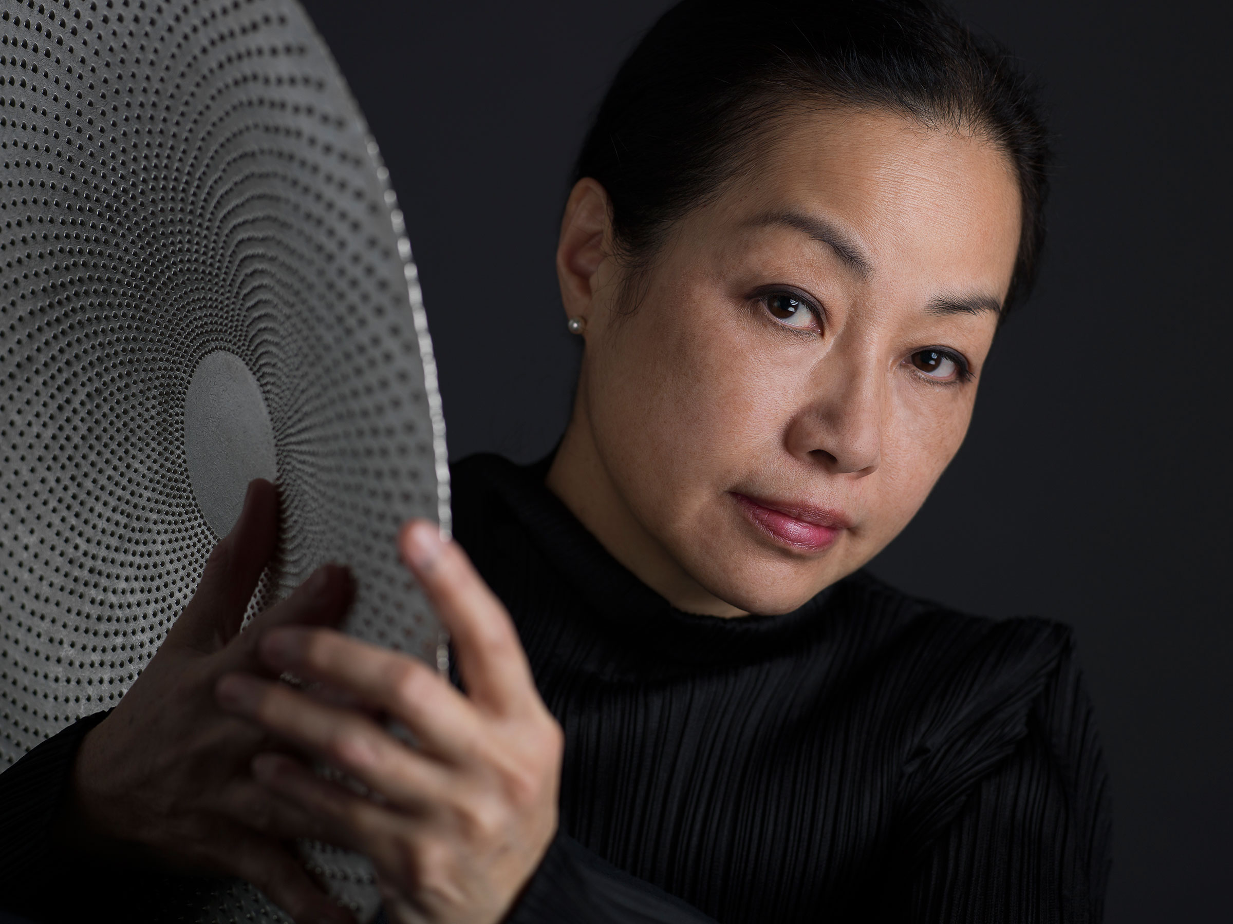 Yuki Ferdinandsen, born in Kyoto and now resident in Denmark, with one of her artworks. Photo: Martin Mydtskov, courtesy of Gallery MONTAN, Copenhagen