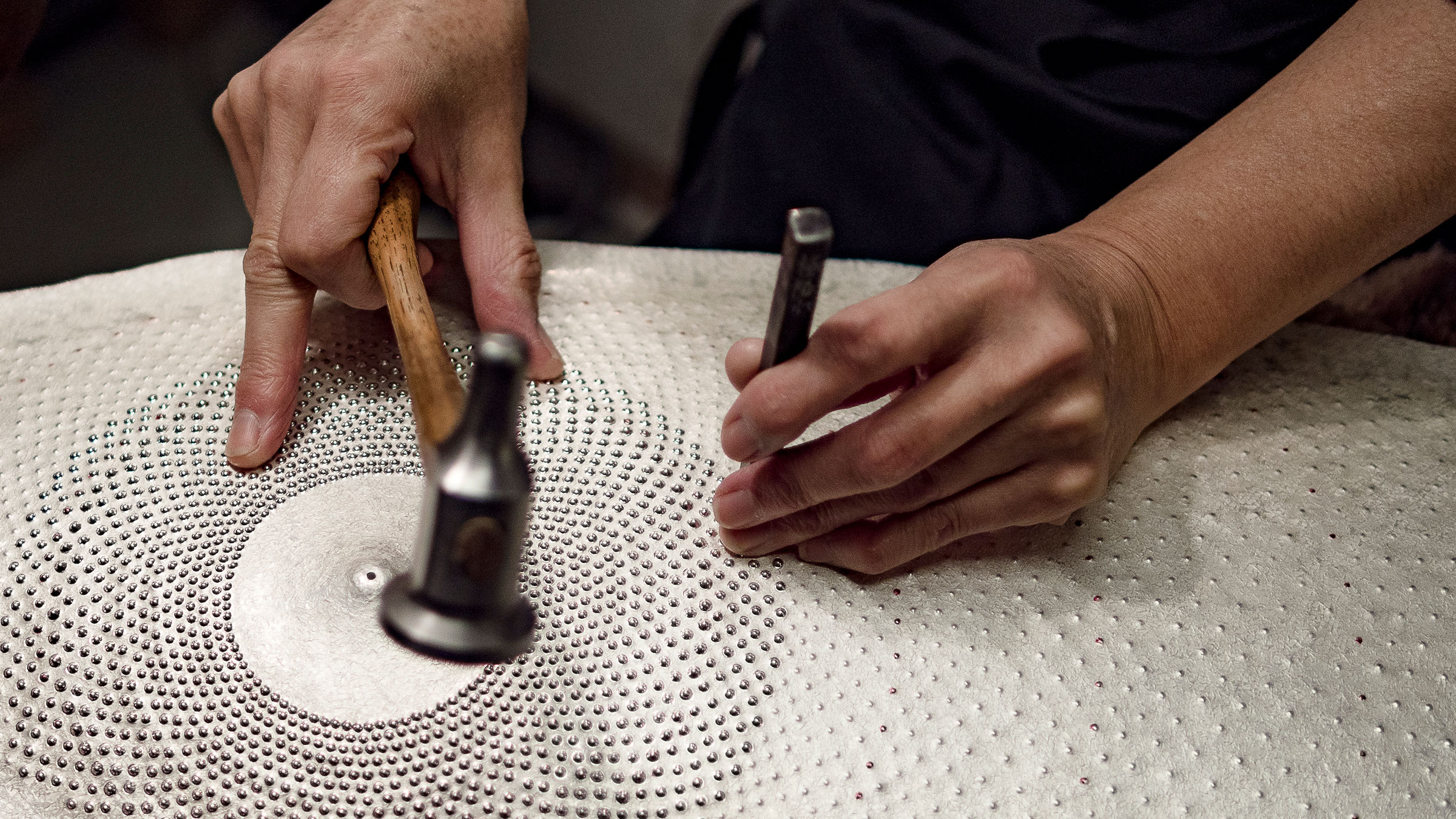 Yuki Ferdinandsen employs the traditional Japanese technique called arare  to create a sequence of regularly spaced raised dots. Photo: Martin Mydtskov, courtesy of Gallery MONTAN, Copenhagen