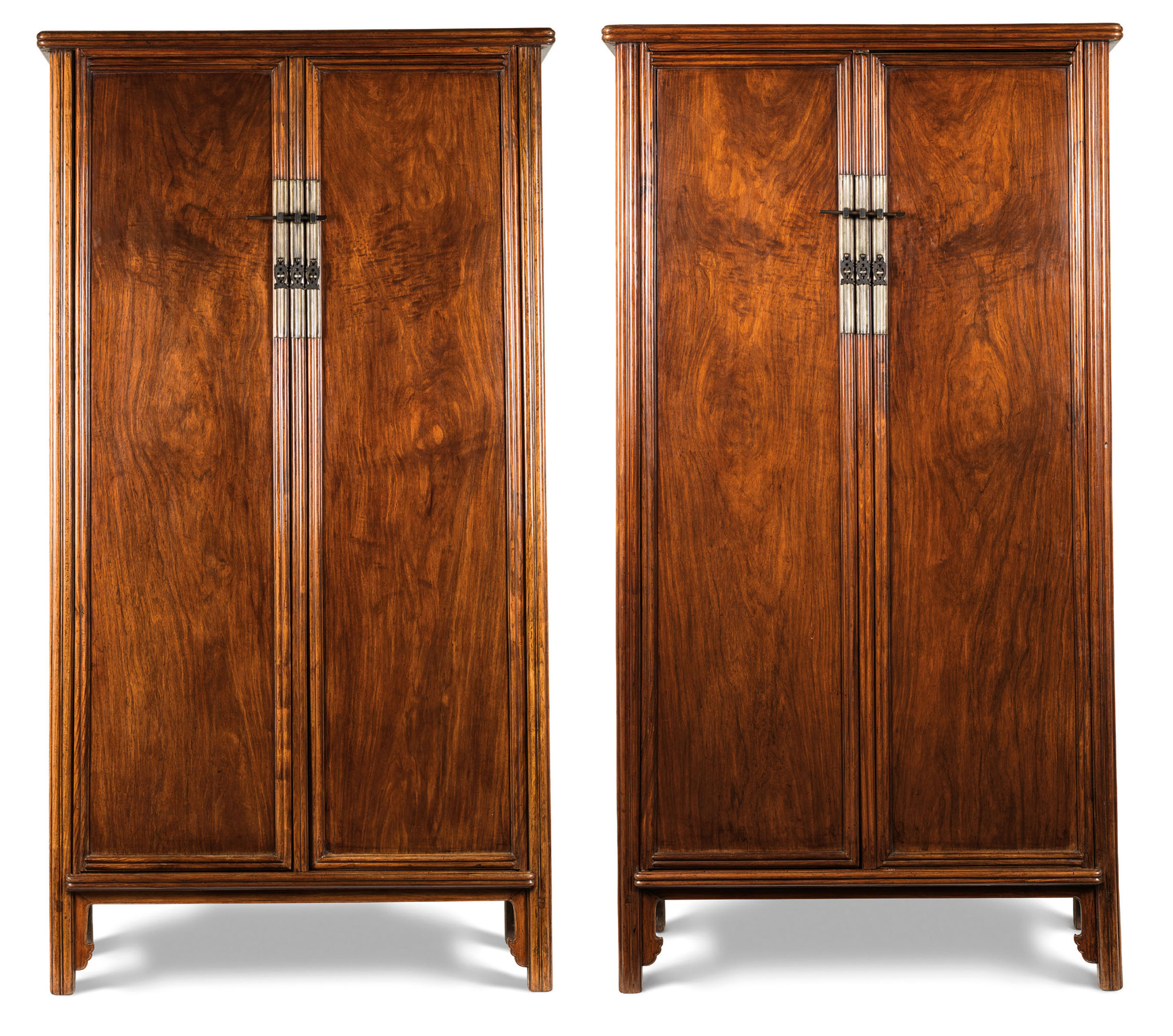 A fine large pair of huanghuali round-corner tapered cabinets, yuanjiaogui, Qing dynasty, 17th-18th century. 69¾  in (177.2  cm) high, 36½  in (92.7  cm) wide, 19½  in (49.5  cm) deep (each). Sold for: HK$36,100,000 on 29 November 2017  at Christie’s in Hong Kong