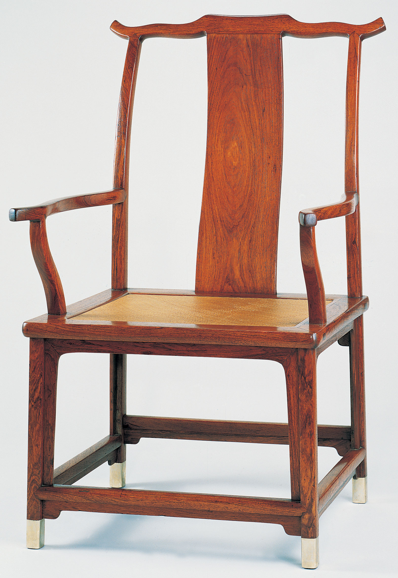 A large huanghuali yokeback armchair, Guanmaoyi, 17th century. Sold for $140,000 on 19 September 1996 at Christie's in New York