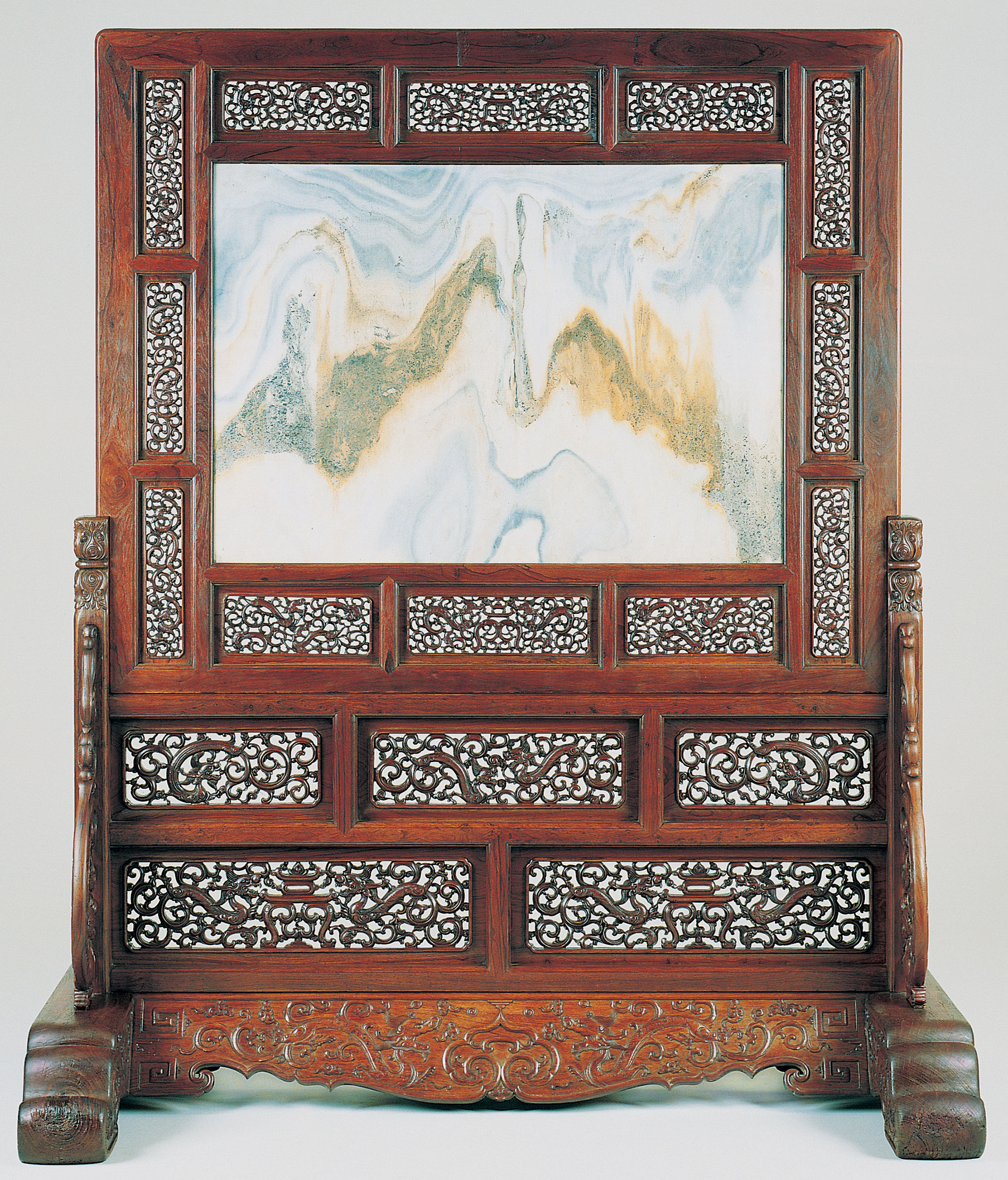 A large rare marble huanghuali and tielimu standing screen, zuopingfeng, 17th century. Sold for $1,102,500 on 19 September 1996 at Christie's in New York