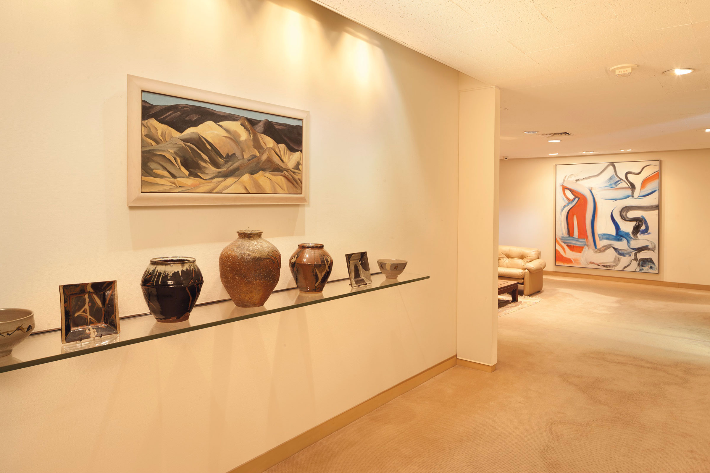 Willem de Kooning’s Untitled XIX hung in David Rockefeller’s private office at Rockefeller Center. In the foreground is Georgia O’Keeffe’s Near Abiquiu, New Mexico (1931), also offered in the Collection of Peggy and David Rockefeller, 1-11 May 2018 at Christie’s in New York Artworks: © 2018 The Willem de Kooning Foundation / Artists Rights Society (ARS), New York; © 2018 Georgia O'Keeffe Museum / Artists Rights Society (ARS), New York © 2018 Georgia O'Keeffe Museum / Artists Rights Society (ARS), New York