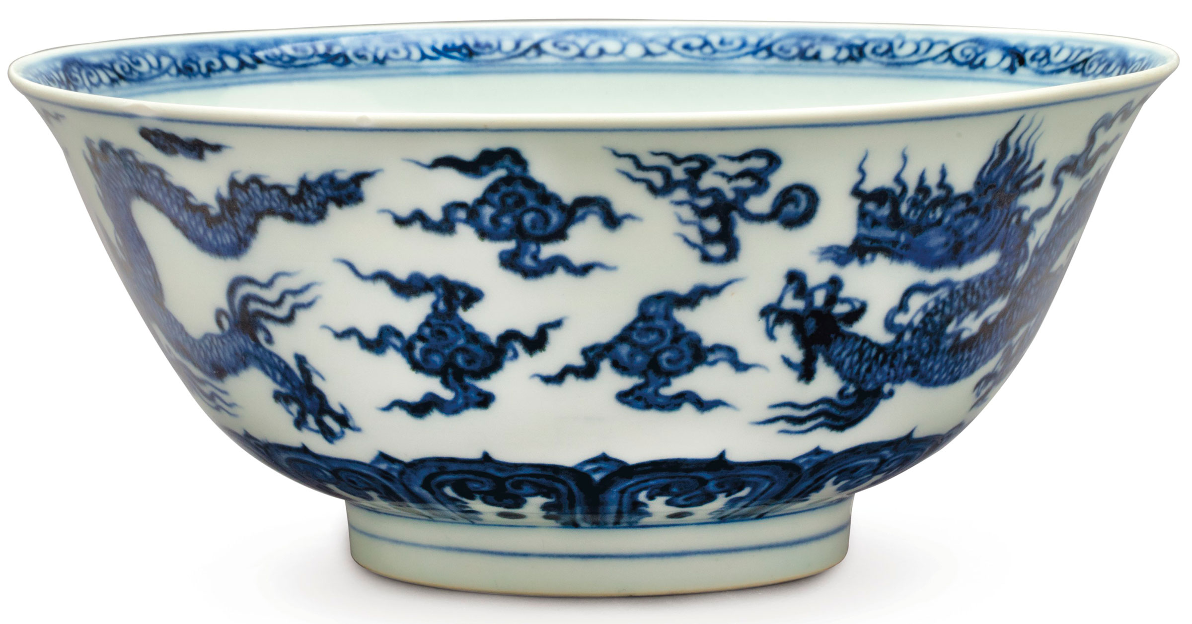 A rare anhua-decorated blue and white ‘dragon’ bowl, Xuande six-character mark in underglaze blue within a double circle and of the period (1426-1435). 8¼ in (21 cm) diam. Estimate: $100,000-150,000. This lot is offered in The Collection of David and Peggy Rockefeller: Travel & Americana on 10 May at Christie’s in New York