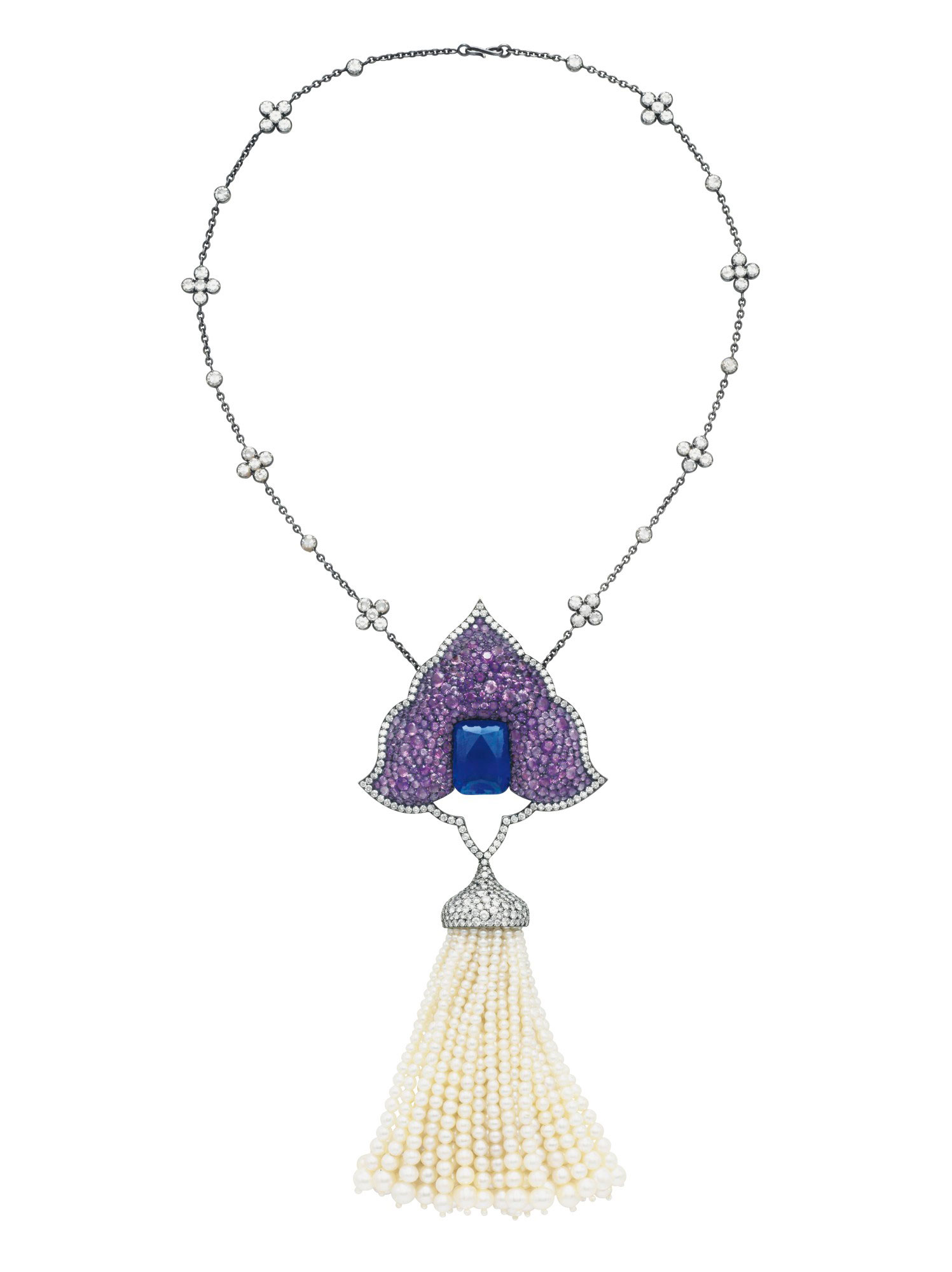 A multi-gem and diamond 'Moghul' pendant-brooch, by JAR. Sold for $432,500 on 17 April 2018 at Christie’s in New York