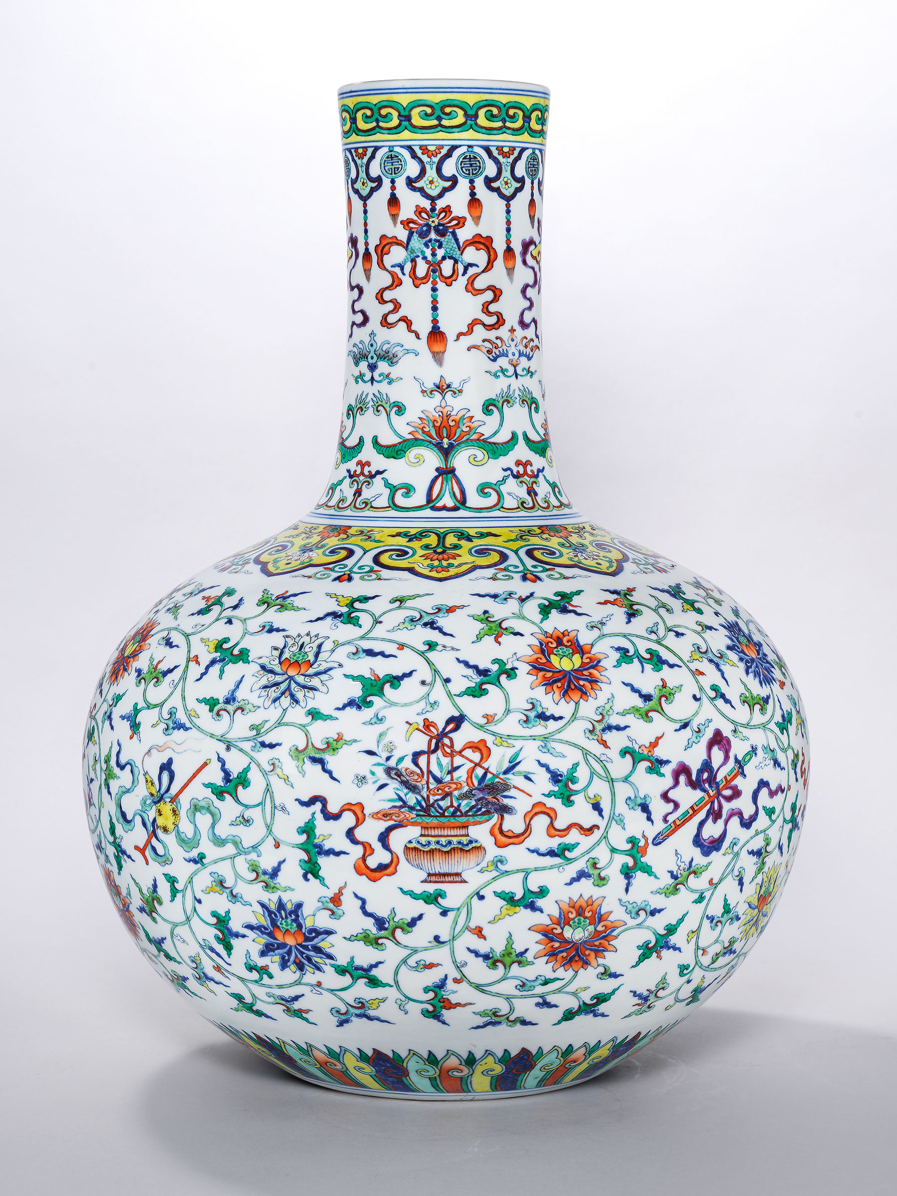 A fine magnificent and extremely rare doucai and famille rose Anbaxian vase, Tianqiuping. Qianlong six-character seal mark in underglaze blue and of the period (1736-1795). 21¼ in (53.9 cm) high. Offered in Celestial Immortals — The Taber Family Tianqiuping from Philbrook Museum of Art on 30 May at Christie’s in Hong Kong and sold for HK$130,600,000