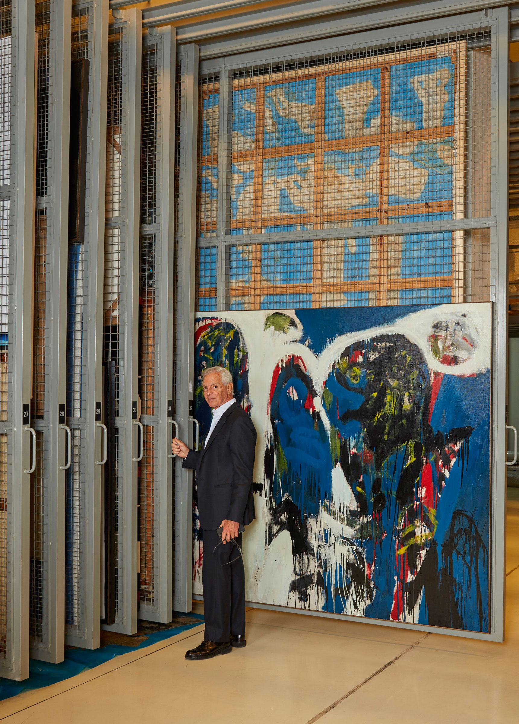 Eduardo Costantini behind the scenes at MALBA and alongside Ernesto Deira's, Desde Adan y Eva No.5, 1963